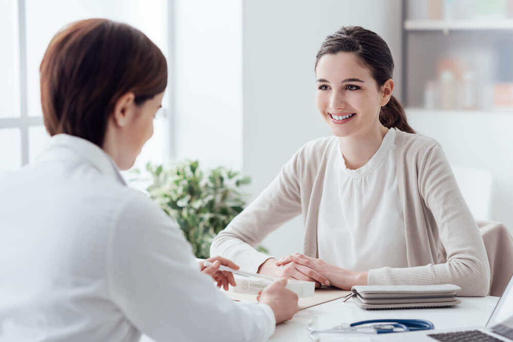 Doctor and patient in consultation at medical office