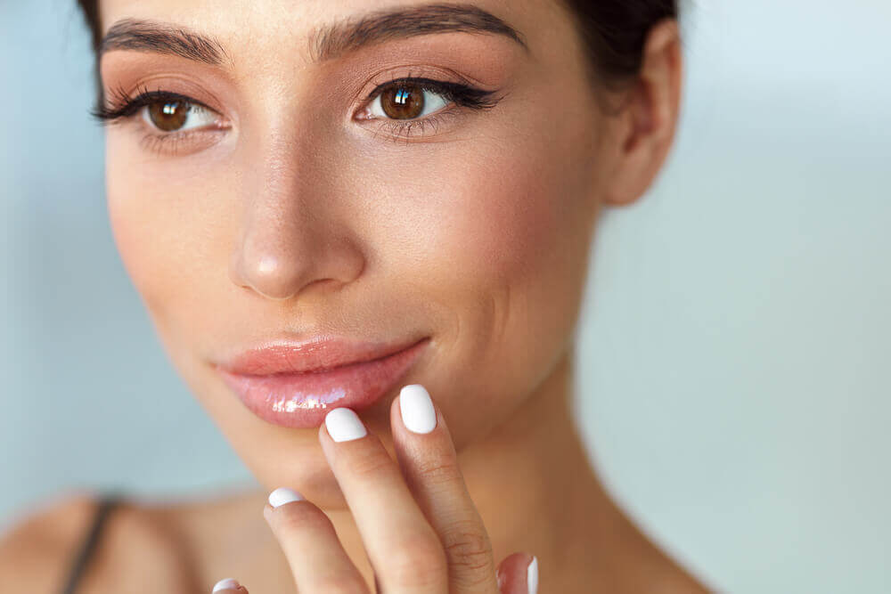 young woman with full healthy lips