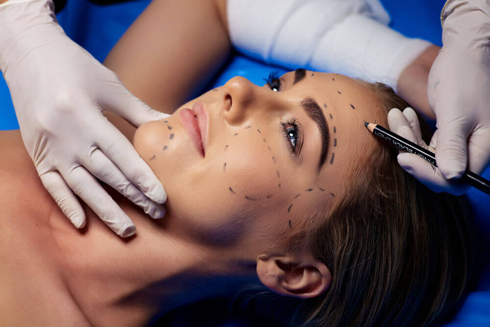 Woman being prepped for cosmetic surgery